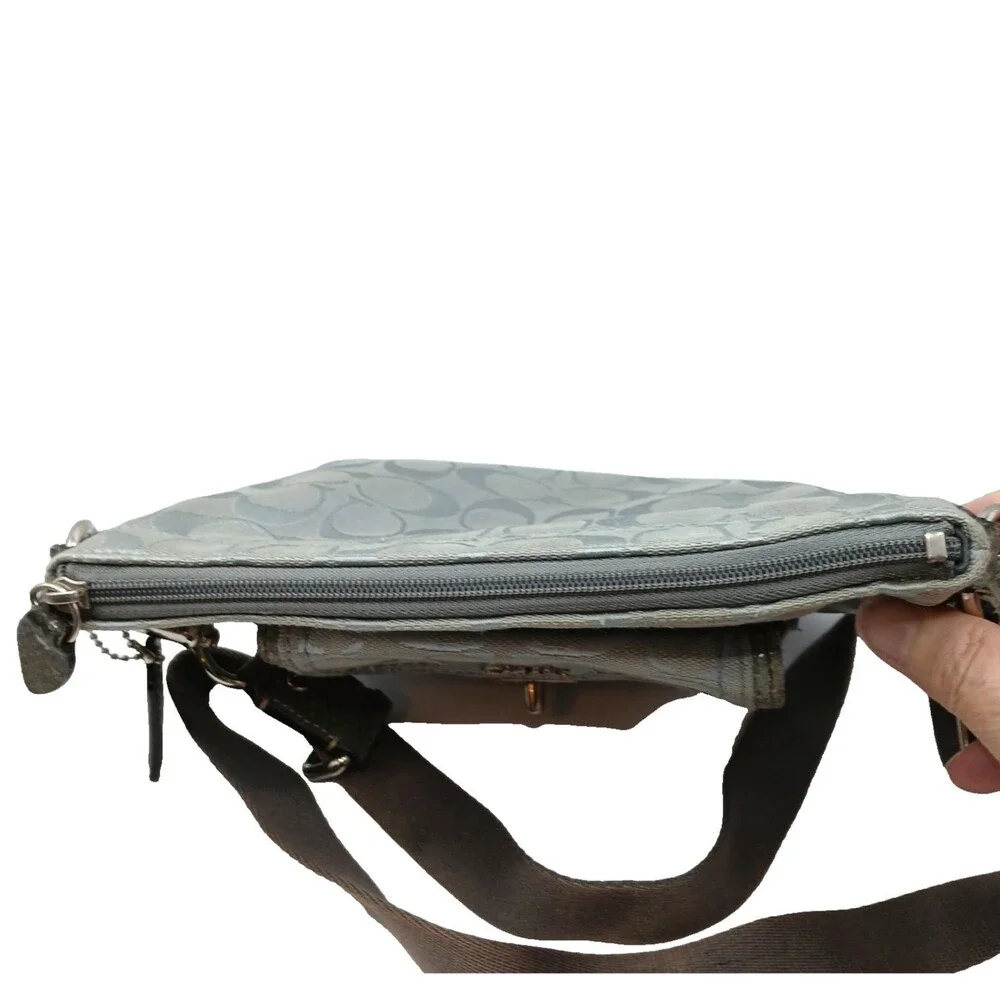 Coach Penelope Signature Turn-Lock Crossbody Bag in Silver With Lavender Lining
